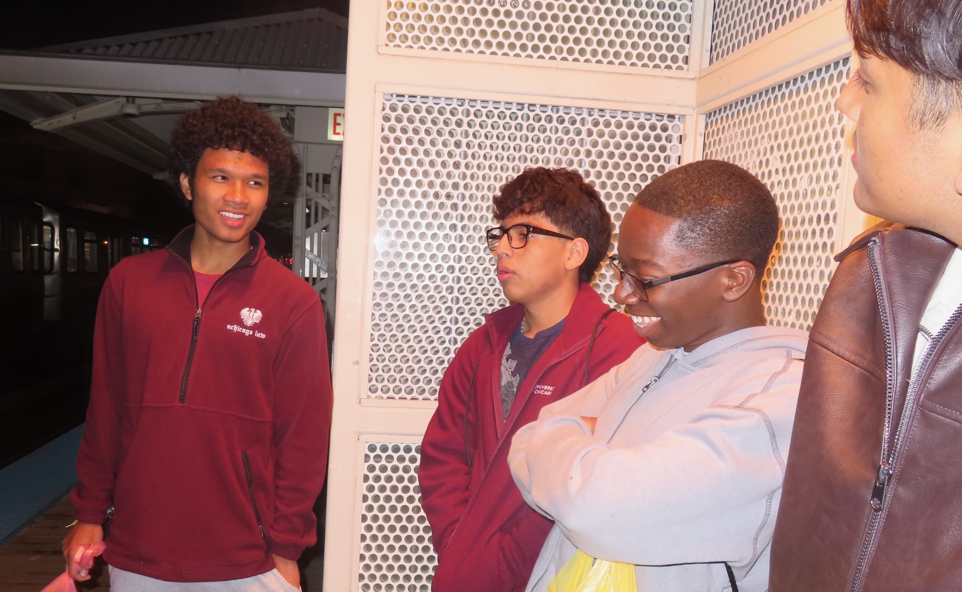 Chaz talking with his peers